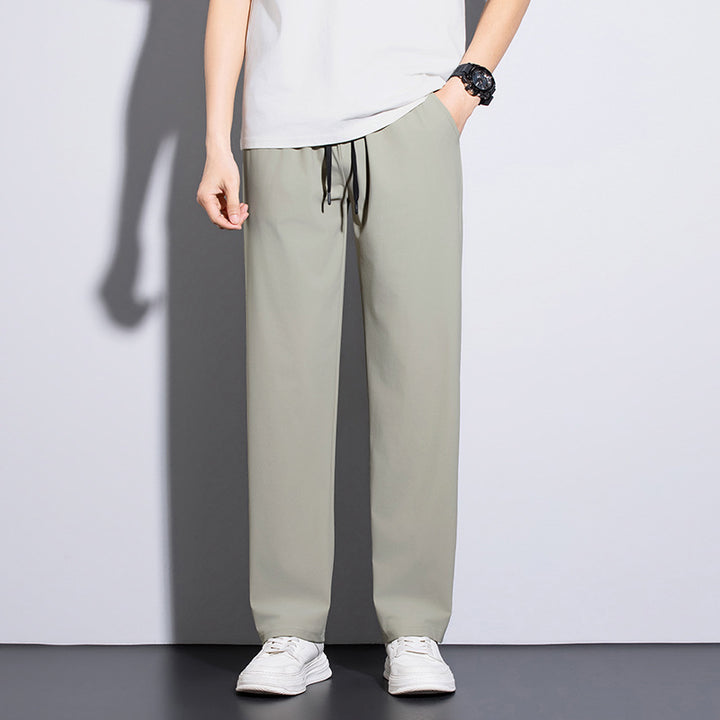 Men's sporty training pants with elastic waistband and practical pockets Mune Fashion