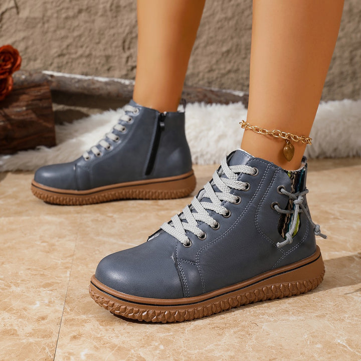 Women's padded lace-up ankle boots with teddy lining, side zipper, and textured rubber sole Mune Fashion