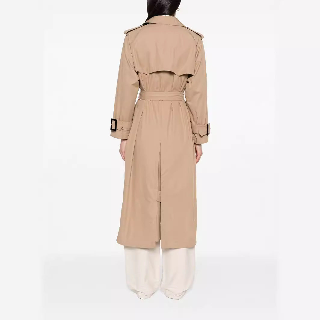 Women's trench coat in maxi length with double-breasted button placket and waist belt Mune Fashion