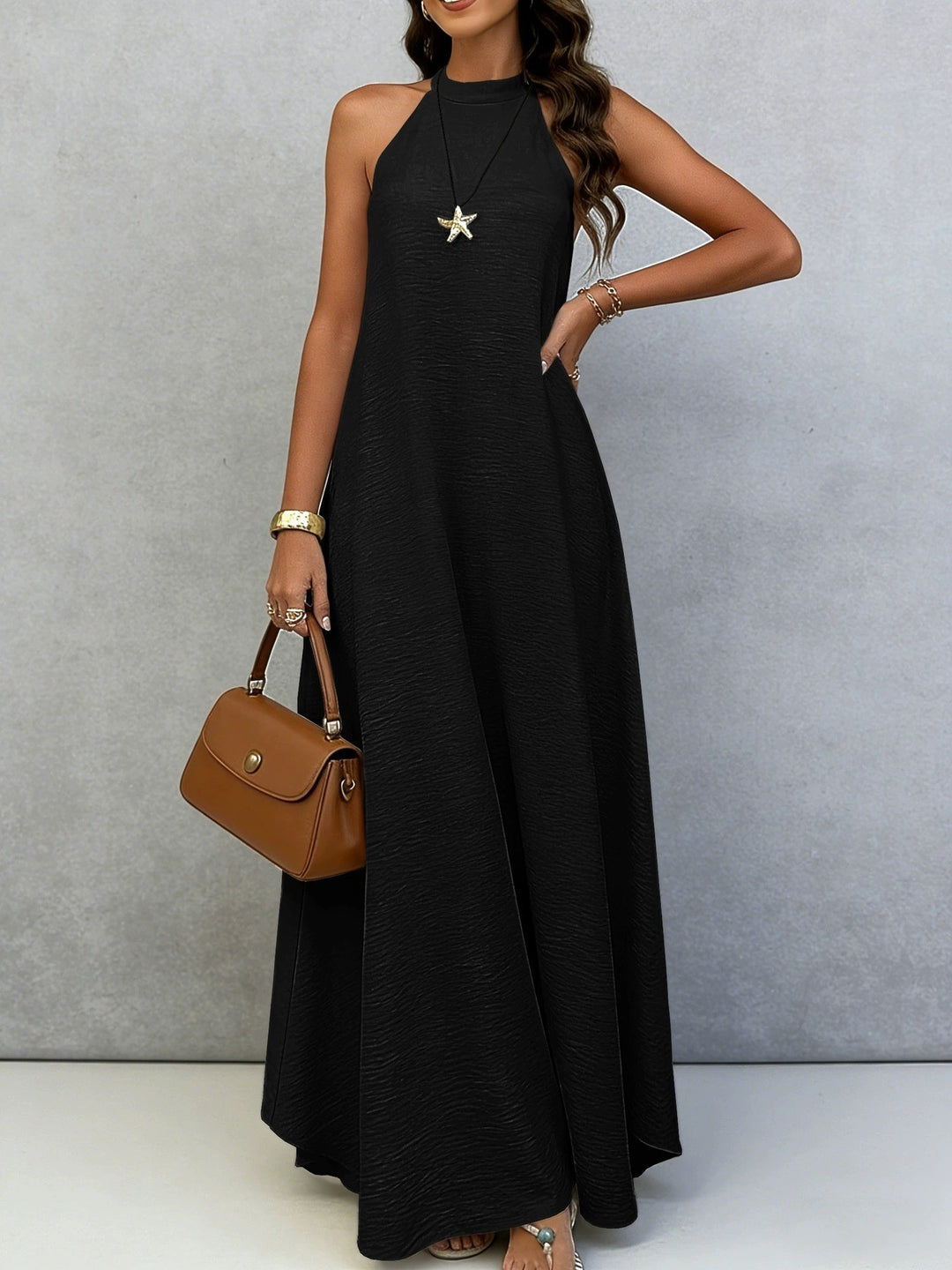 Women’s sleeveless maxi dress with high standing collar, flowing A-line and crepe texture Mune Fashion