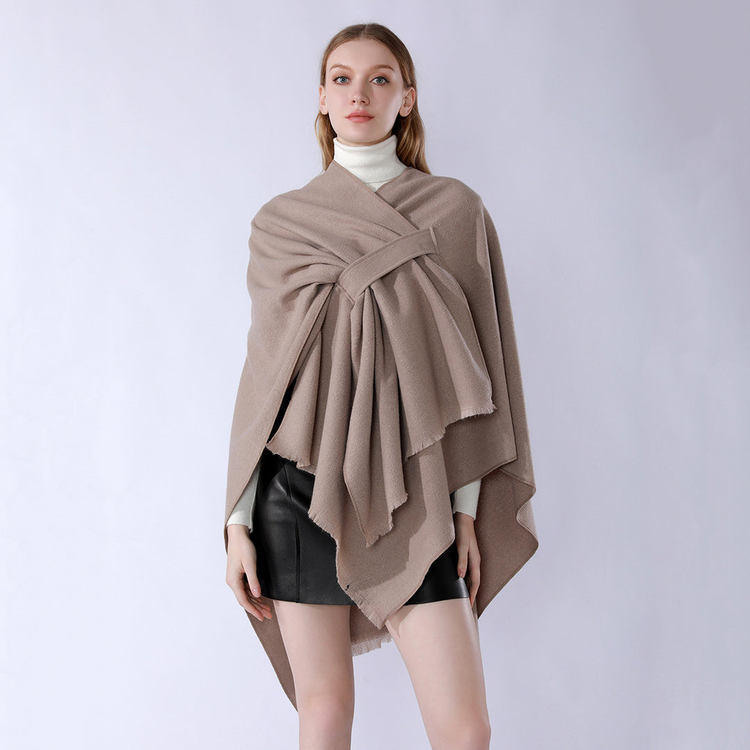Women's knit poncho with geometric block pattern and fringes Mune Fashion