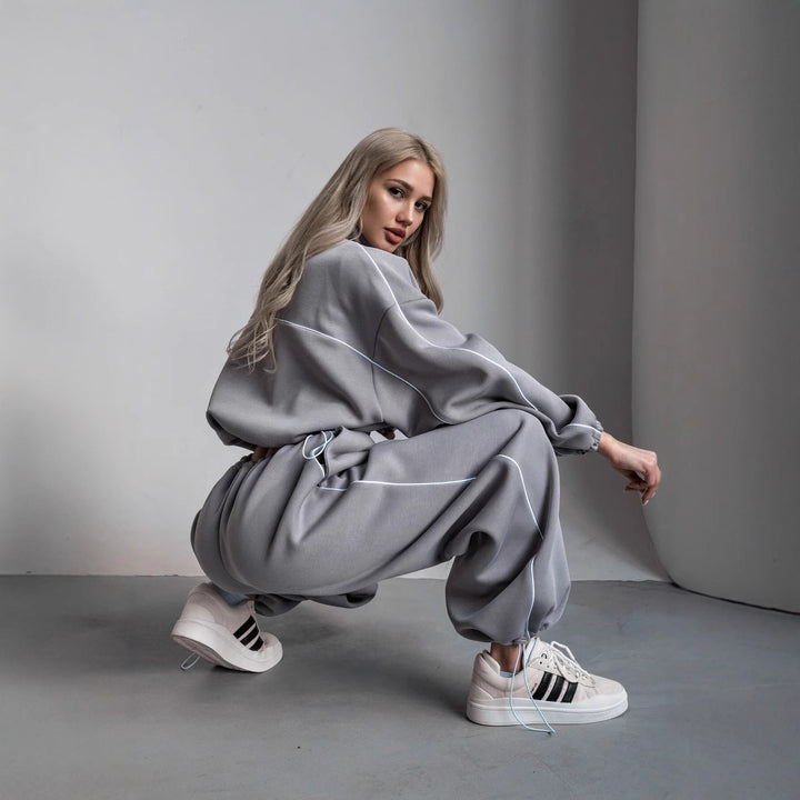 Women's cropped zip hoodie with drawstring waistband, oversized sleeves and contrasting piping Mune Fashion