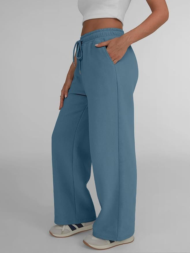 Women's wide lounge pants with high elastic waistband, adjustable drawstring and flowing palazzo silhouette Mune Fashion