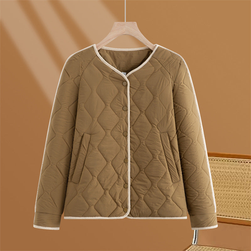 Women’s quilted transitional jacket with diamond stitching, round neck and press stud placket Mune Fashion