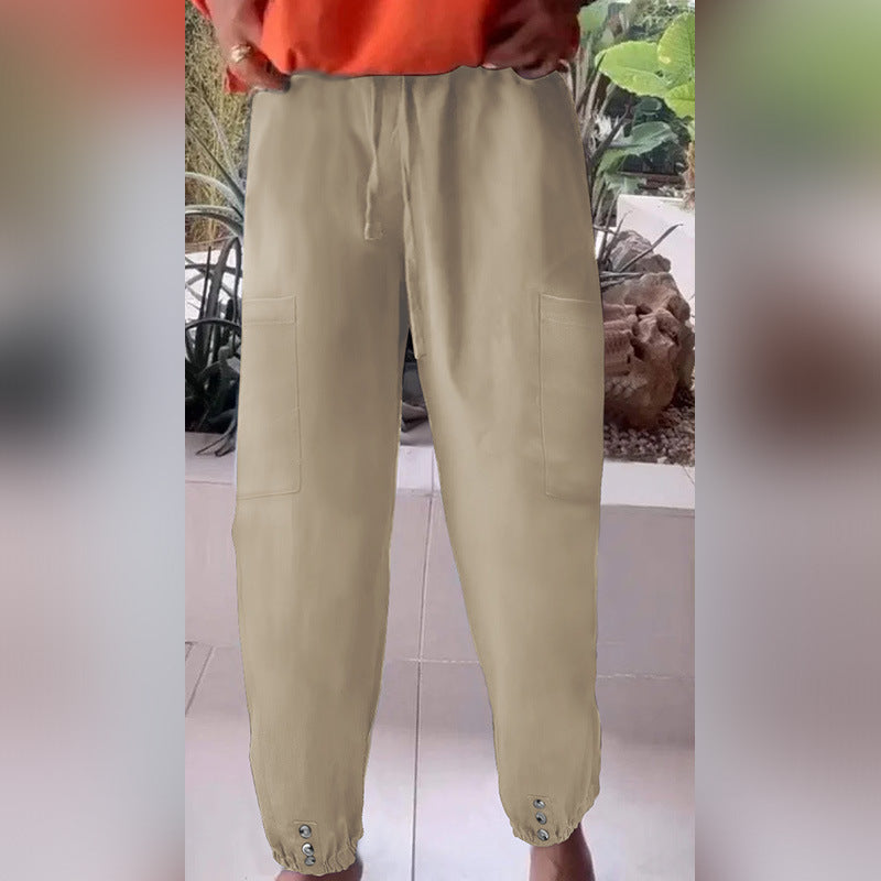 Ladies cargo jogging pants with drawstring, patch pockets and button cuffs Mune Fashion