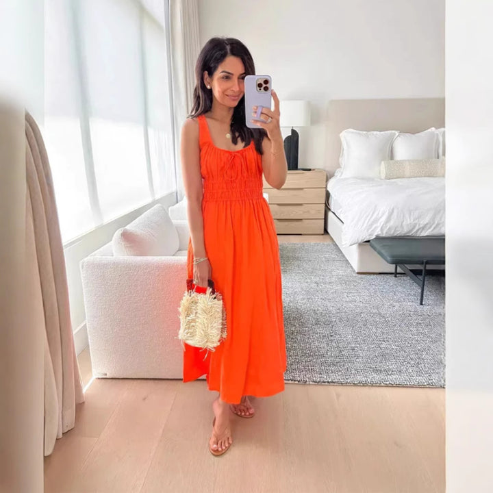 Women's knee-length linen look dress with smocked bodice, elastic waistband and wide straps Mune Fashion