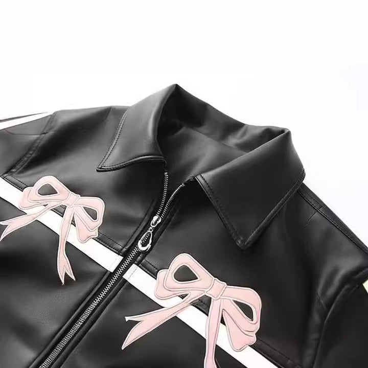 Ladies nan sporty faux leather jacket with bow appliqué and contrasting side stripes Mune Fashion