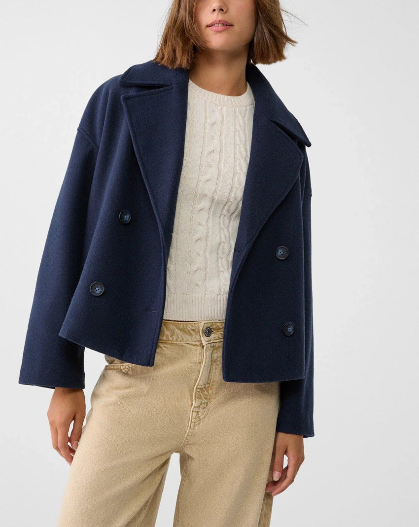 Women’s short cut double-breasted wool blend peacoat with wide lapels and boxy silhouette Mune Fashion