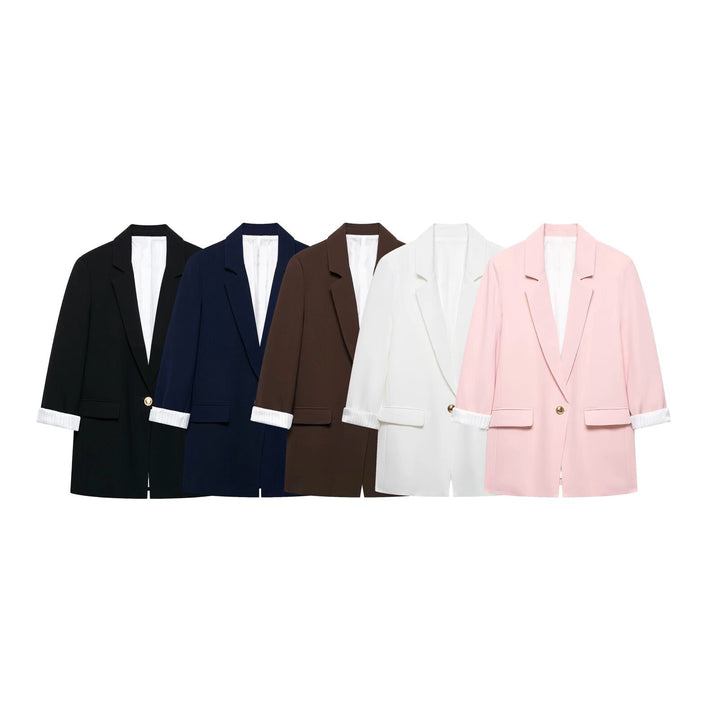 Women's tailored long blazer with cuffed sleeves and decorative button Mune Fashion