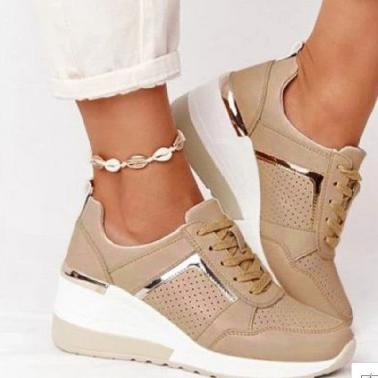 Women's wedge sneakers with perforated upper material, padded comfort collar and reflective metal details Mune Fashion