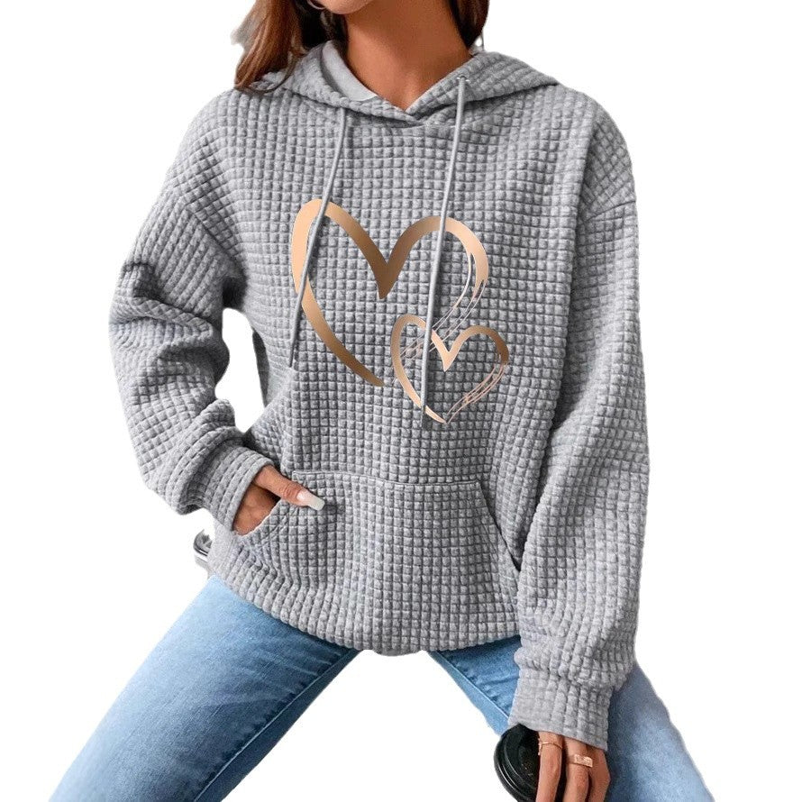 Women's hooded sweatshirt with waffle structure, kangaroo pocket and metallic heart print Mune Fashion