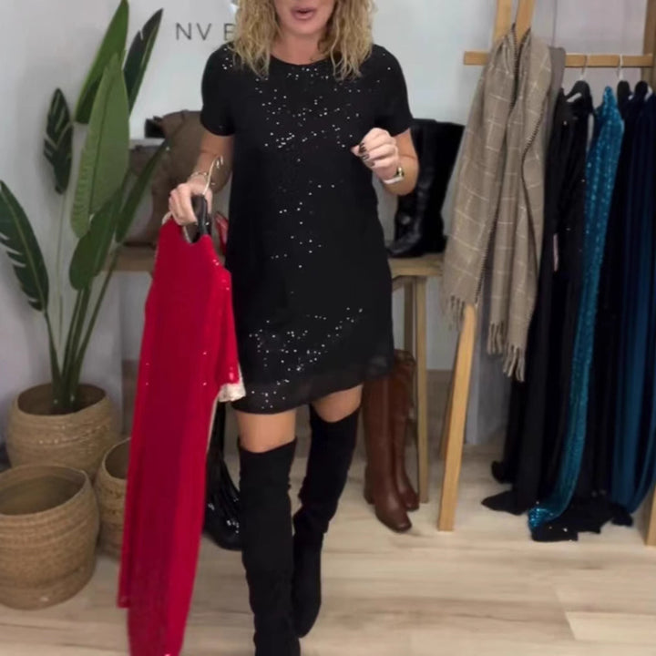 Women's sparkling shift mini dress with sequin trim and transparent hem Mune Fashion