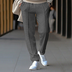 Unisex nan tapered leisure pants with crease, elastic drawstring waistband and straight leg Mune Fashion