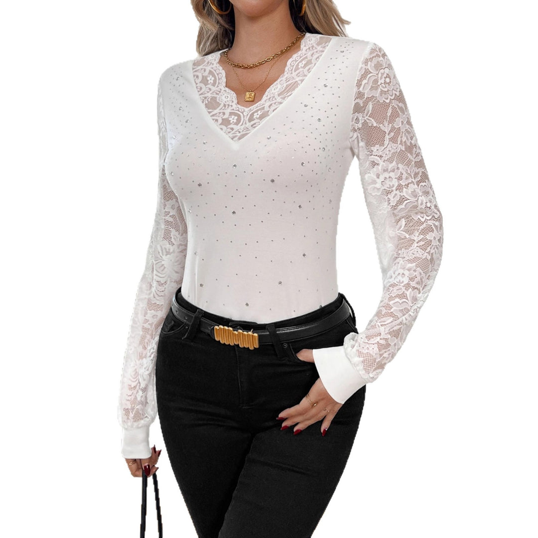 Women's figure-hugging lace top with V-neck, sheer lace sleeves and rhinestone trim Mune Fashion