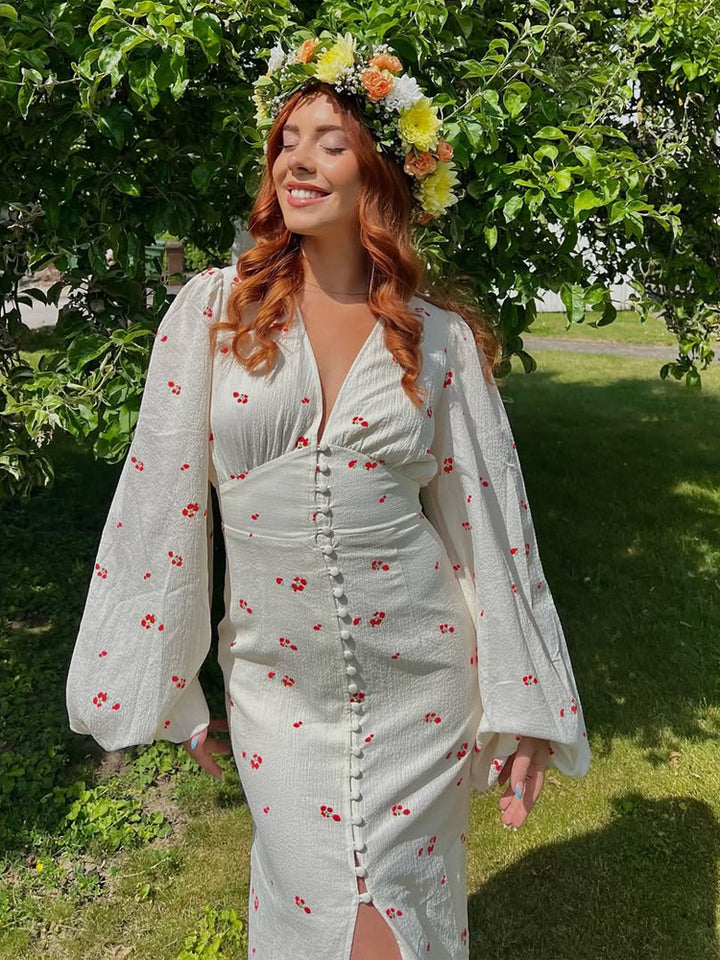 Ladies midi dress with puff sleeves, V-neckline and decorative button placket Mune Fashion