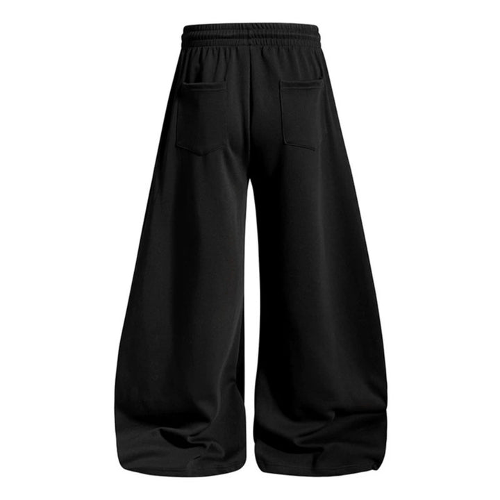 Women's loose jogging pants with elastic waistband and decorative lacing Mune Fashion