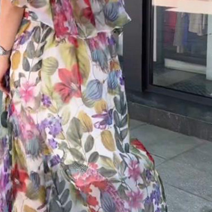 Women’s airy chiffon maxi dress with floral print, gathered round neckline and elastic waistband Mune Fashion