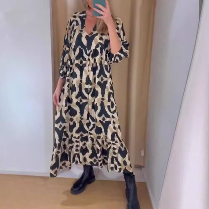 Women's flowing tiered maxi dress with V-neck, gathered bust panel and three-quarter sleeves Mune Fashion