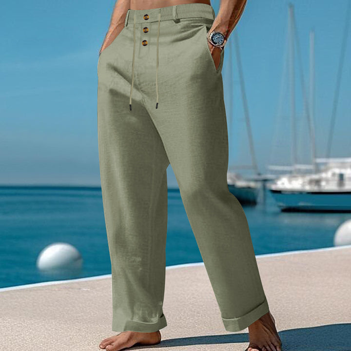 Men's wide summer pants made of linen-cotton blend with triple-button placket, drawstring waistband, and cuffed hem Mune Fashion