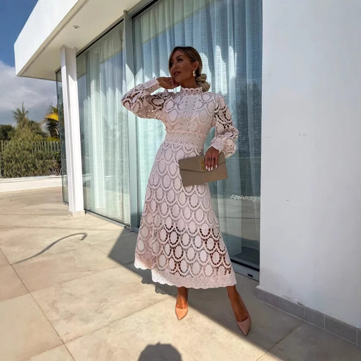 Women's crocheted midi dress with stand-up collar, transparent lace sleeves, and fitted A-line Mune Fashion