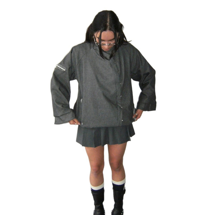 Women’s oversized boxy jacket with asymmetric button closure and arm pocket Mune Fashion