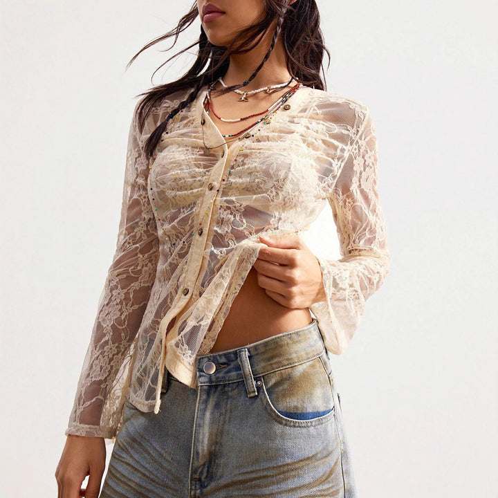 Women's delicate lace cardigan with tailored silhouette and button placket Mune Fashion