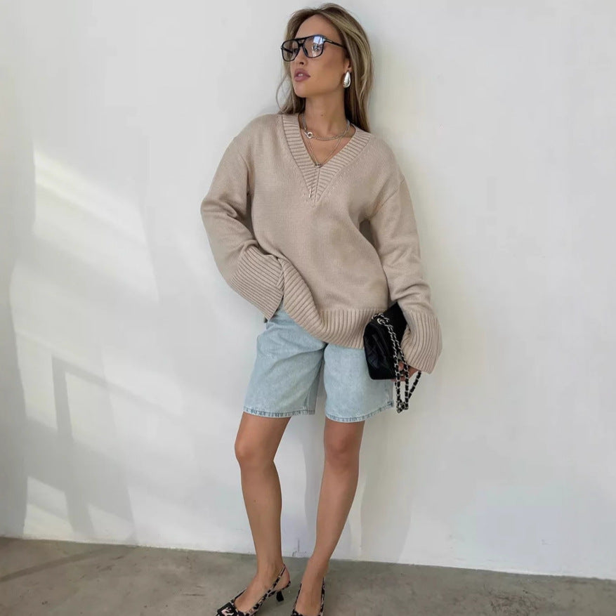 Women’s oversized fine knit sweater with deep V-neckline, ribbed cuffs and loose silhouette Mune Fashion
