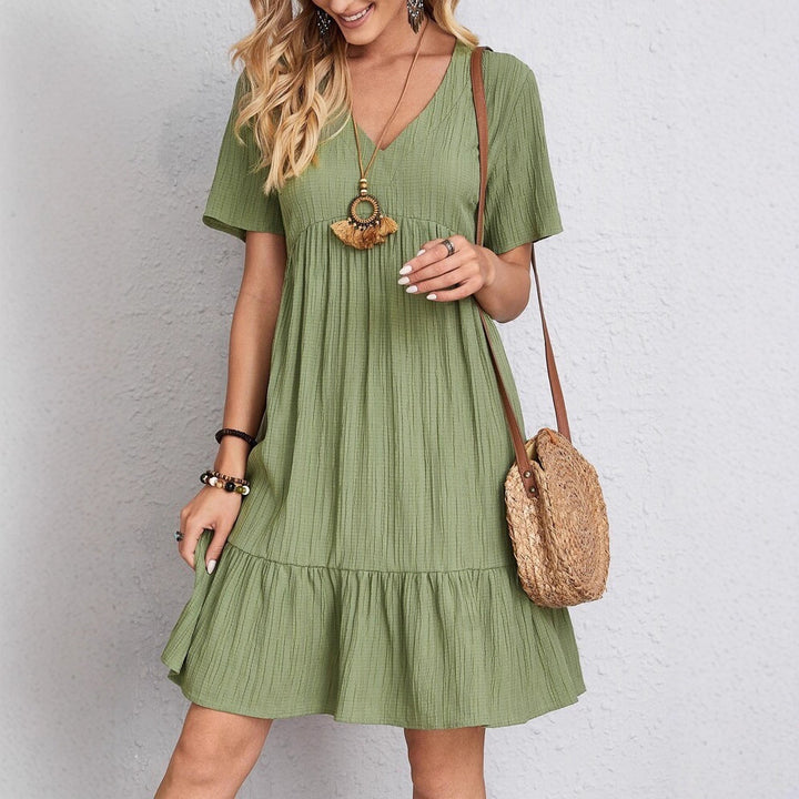 Women nan Crinkle summer dress with V-neck, empire seam and ruffle hem Mune Fashion