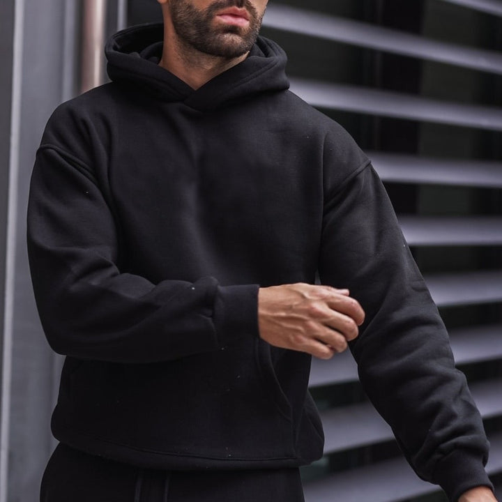 Unisex nan Heavyweight hoodie with double-stitched kangaroo pocket, reinforced seams, and soft fleece lining Mune Fashion