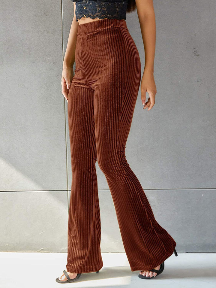 Women's high-waisted ribbed velvet flare trousers with wide flare and elastic waistband Mune Fashion