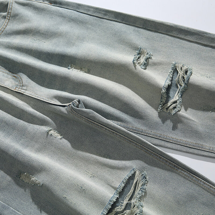 Unisex Relaxed-Fit Vintage-Jeans with high waist and distinctive ripped knee section Mune Fashion