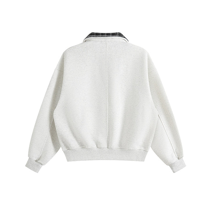 Unisex layered look sweatshirt with sewn-in check collar and side pocket openings Mune Fashion