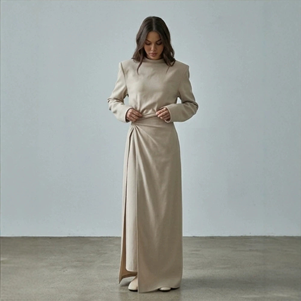 Women’s maxi dress with tailored silhouette, flared skirt and striking shoulders Mune Fashion