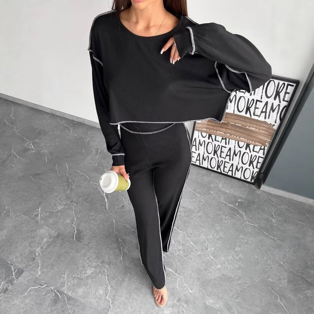 Women Cropped Oversized Sweatshirt with Overlock Seams and High-Waist Flared Pants Set Mune Fashion