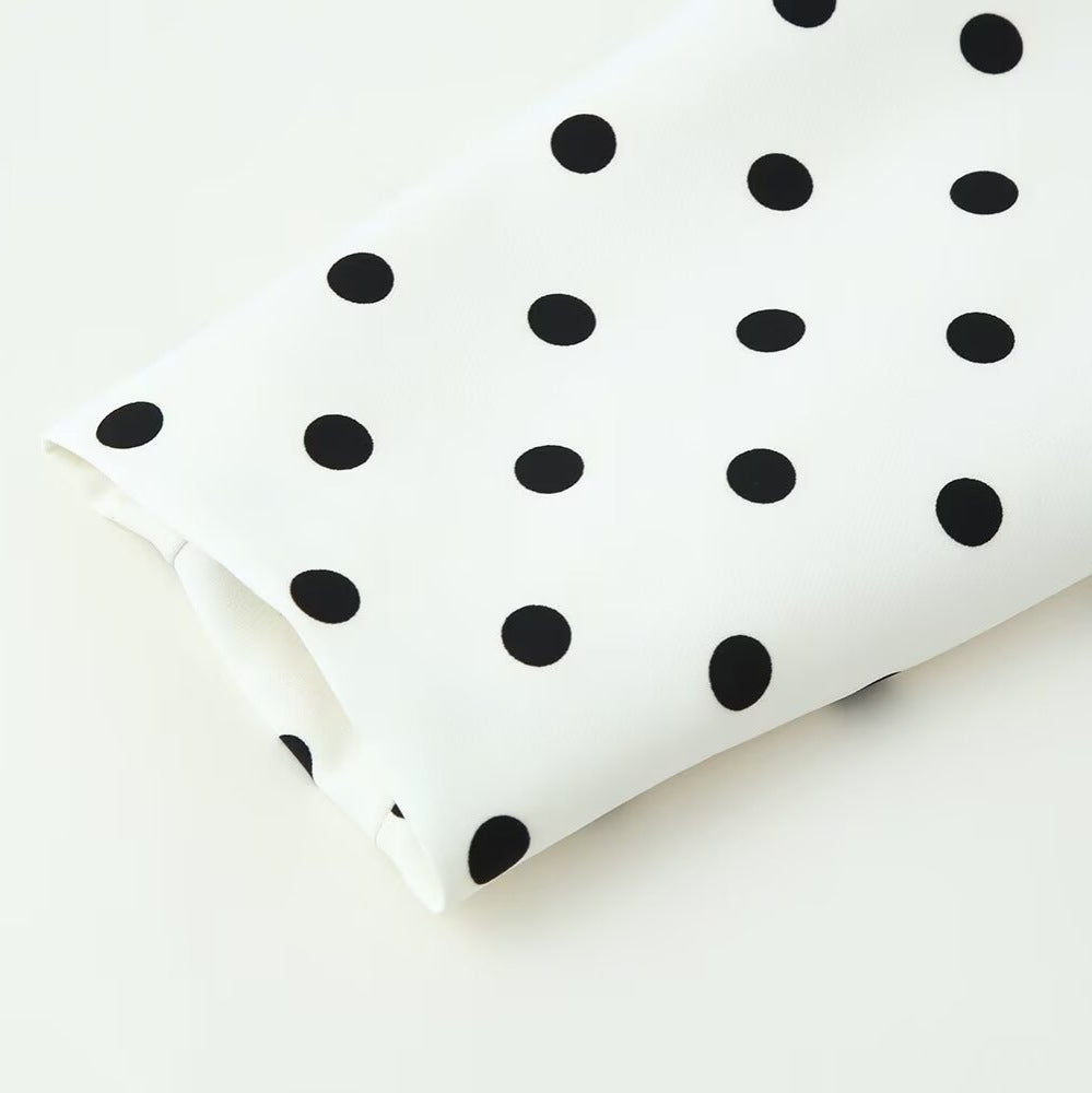 Women nan tailored short jacket with round neckline, contrast piping and polka dot pattern Mune Fashion