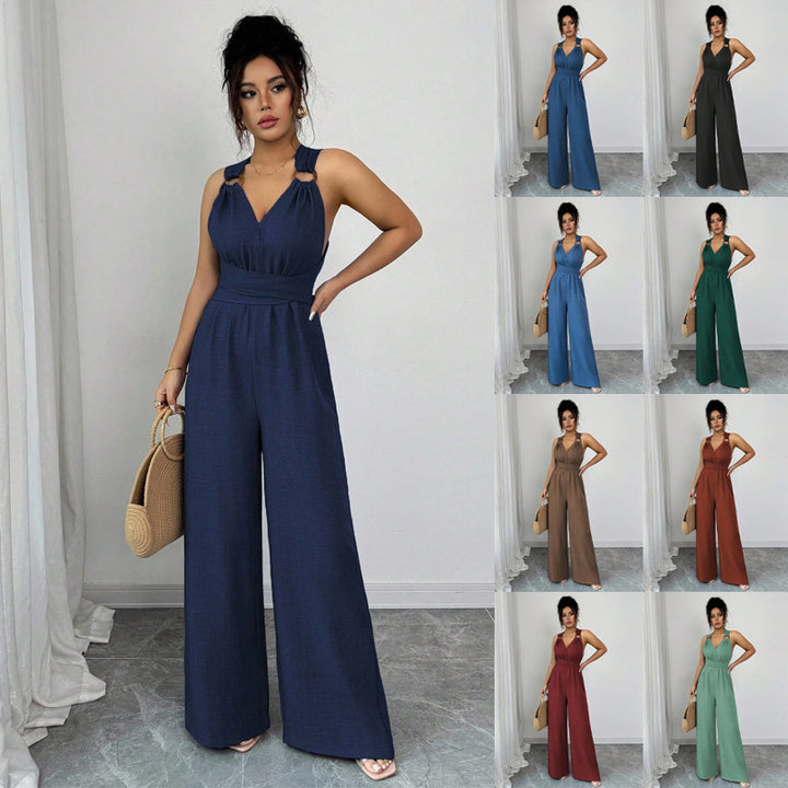 Women’s jumpsuit with wide leg, tailored wrap belt and eyelet straps Mune Fashion