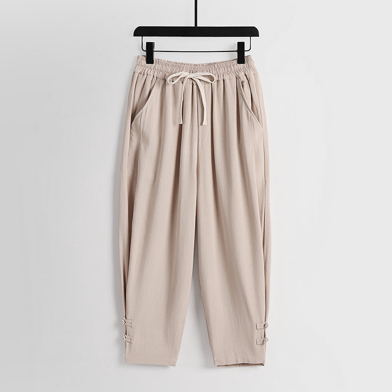 Women's casual jogging pants with drawstring and decorative buttons at the ankle Mune Fashion