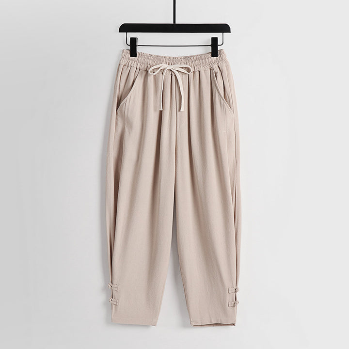 Women's casual jogging pants with drawstring and decorative buttons at the ankle Mune Fashion
