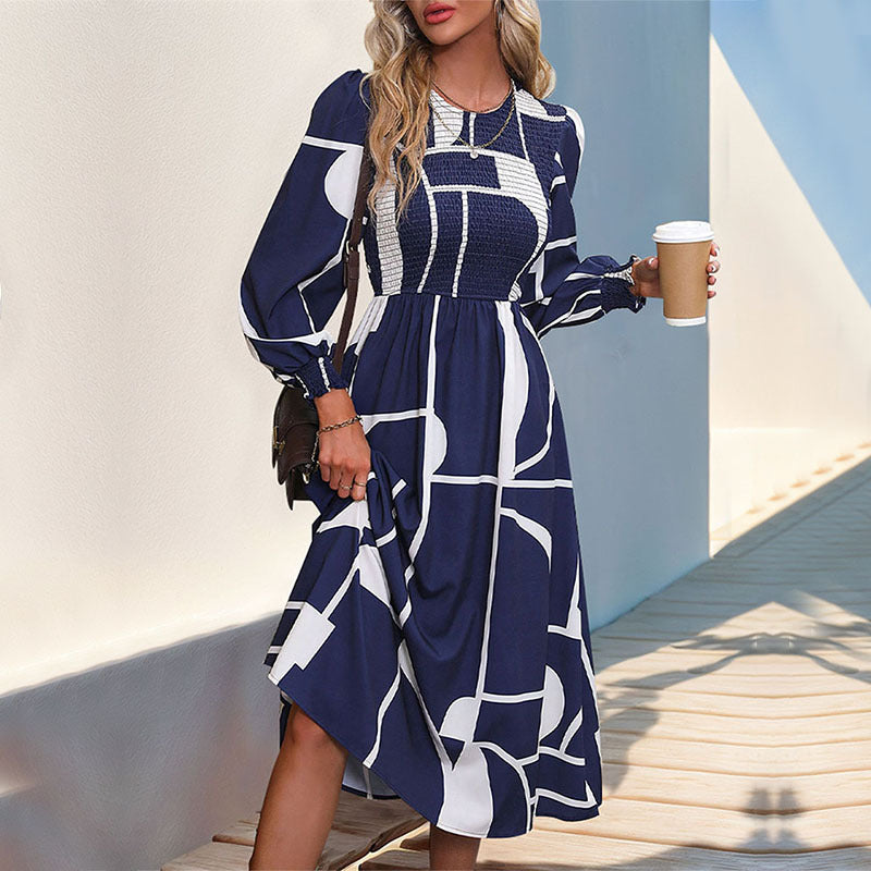 Women's A-line midi dress with smocked bustier, long balloon sleeves, and graphic print Mune Fashion