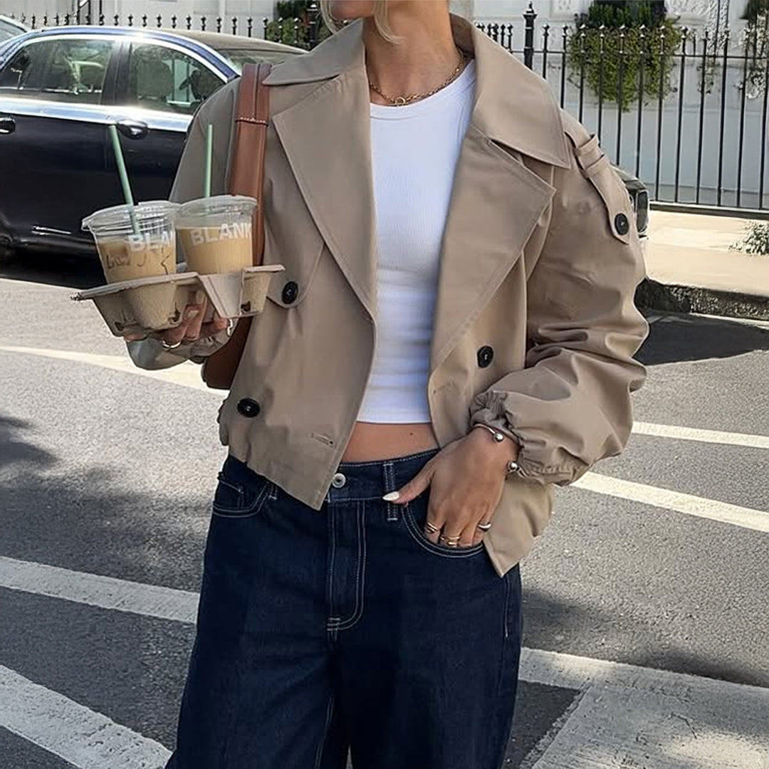 Women's shortened trench coat with double-breasted front, wide lapels, and elastic cuffs Mune Fashion