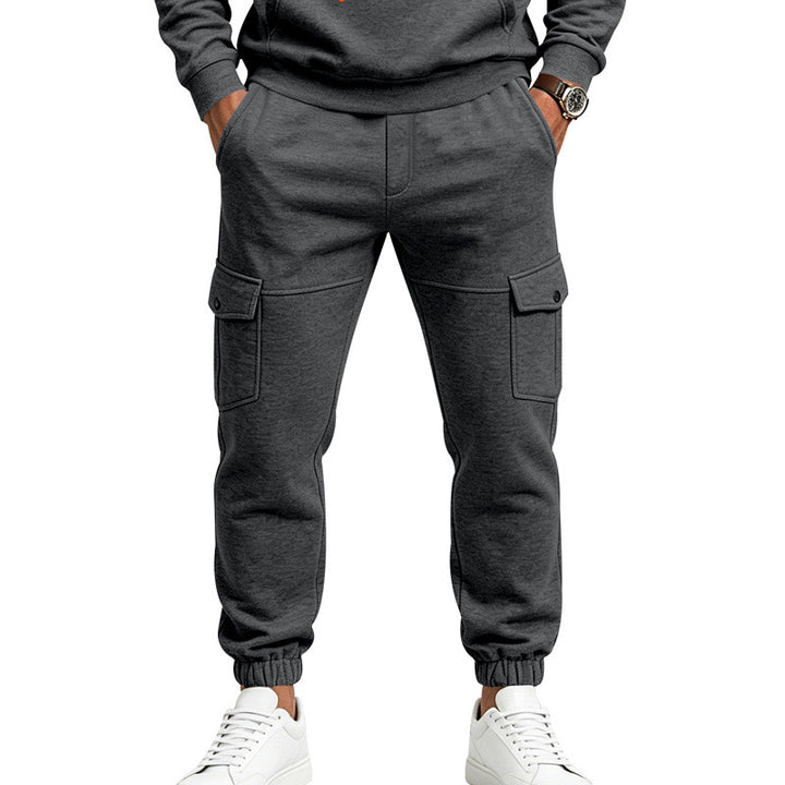 Men's cargo jogging pants with side flap pockets, drawstring and elastic cuffs Mune Fashion