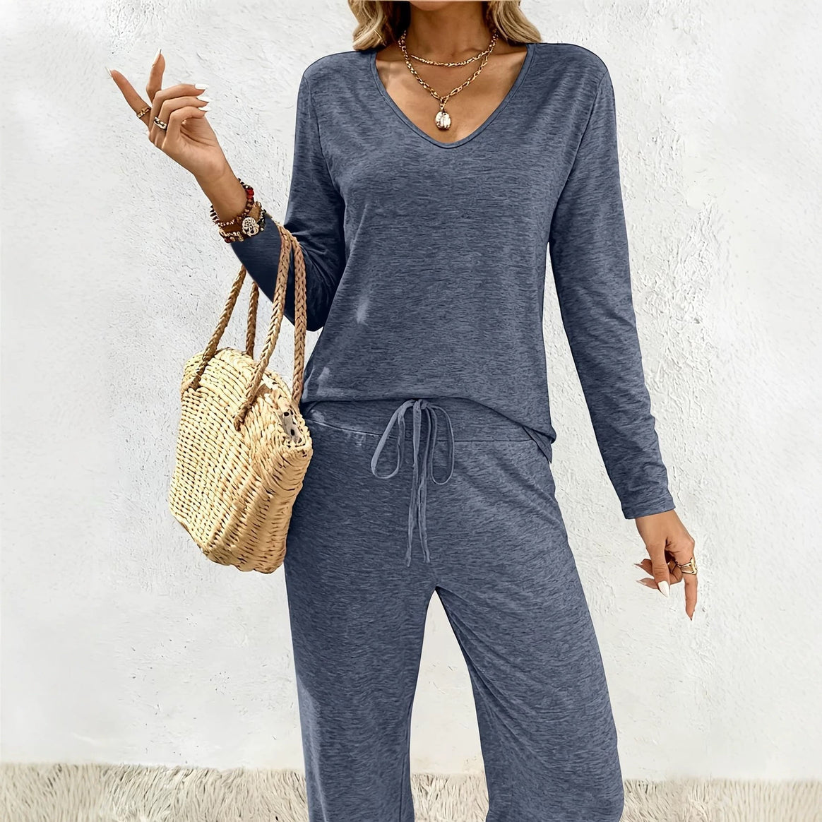 Women’s lounge set made of soft viscose-modal blend with V-neck, drawstring pants, and wide leg Mune Fashion