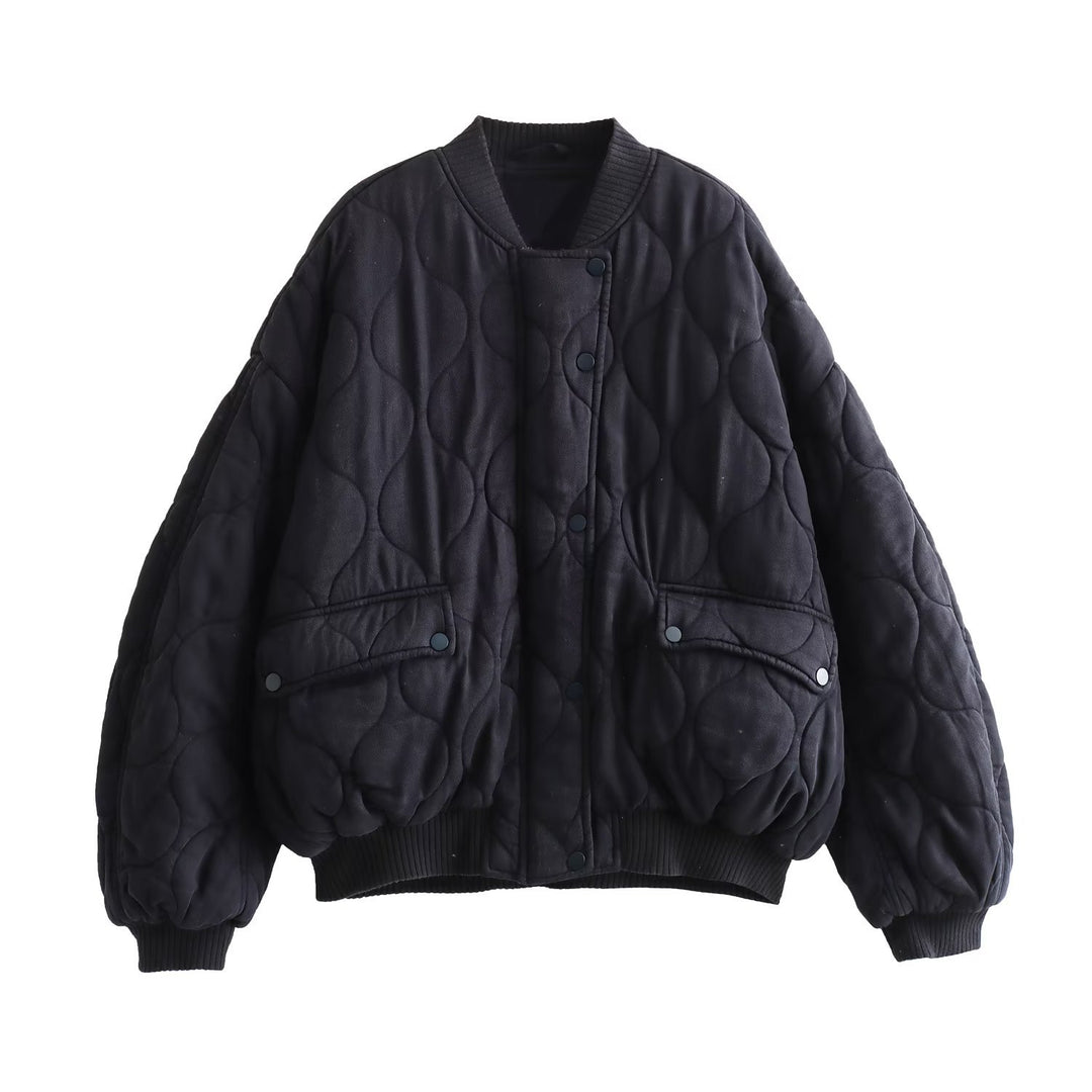 Women's quilted bomber jacket with oversized silhouette, ribbed cuffs, and flap pockets Mune Fashion