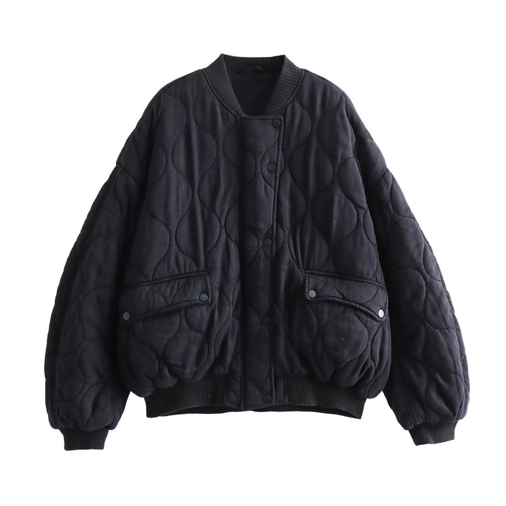 Women's quilted bomber jacket with oversized silhouette, ribbed cuffs, and flap pockets Mune Fashion