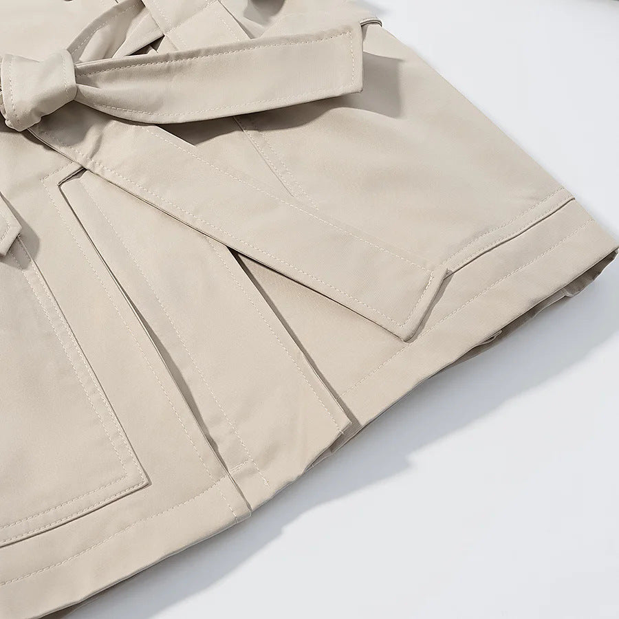 Women's cropped coat jacket with overlapping shawl collar, tie belt, and snap button placket Mune Fashion