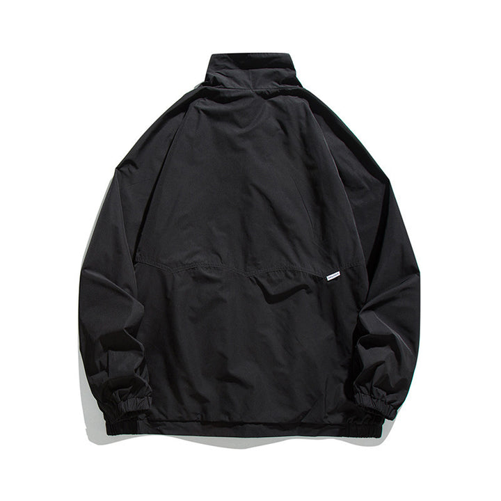 Men's Lightweight Oversized Field Jacket made of technical nylon with stand-up collar, concealed zipper, and flap pockets Mune Fashion