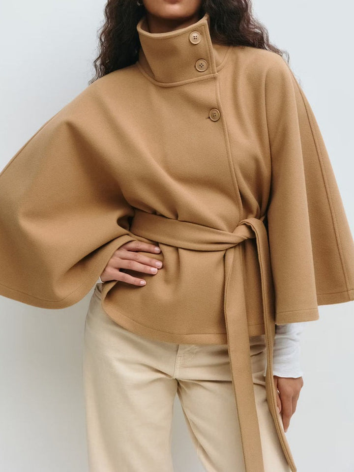 Women's Widely Cut Cape Coat with High Stand-up Collar, Button Placket, and Tie Belt Mune Fashion