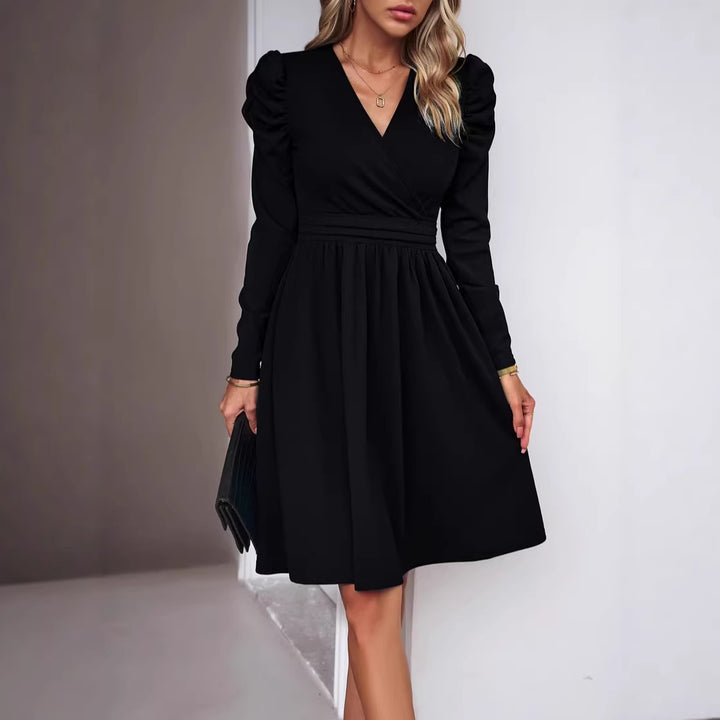 Women's wrap dress with V-neck, gathered puff sleeves, and fitted pleated skirt Drune