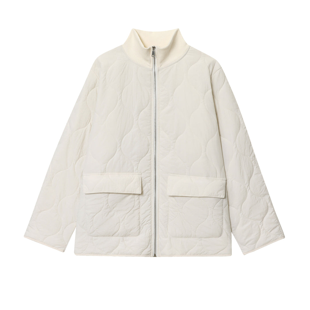 Women's lightweight quilted jacket with round quilting, high ribbed collar, and patch flap pockets Mune Fashion