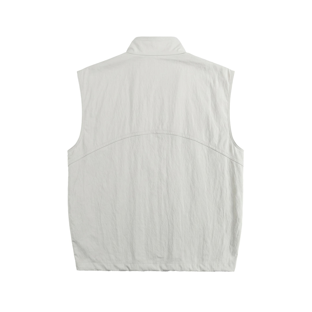 Men's utility vest with high stand-up collar, snap button placket and large patch pockets Mune Fashion